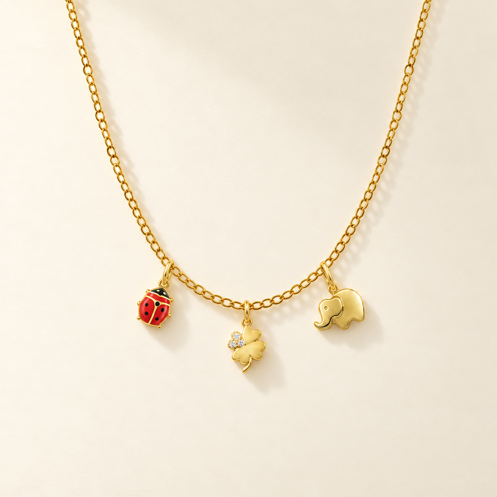 Collana Fancy con Coccinella, Quadrifoglio ed Elefantino in Oro Giallo | Facco Gioielli
