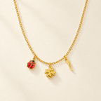 Collana Fancy con Coccinella, Quadrifoglio e Cornetto in Oro Giallo | Facco Gioielli