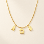 Collana Fancy con Bambino, Casa e Bambina in Oro Giallo | Facco Gioielli