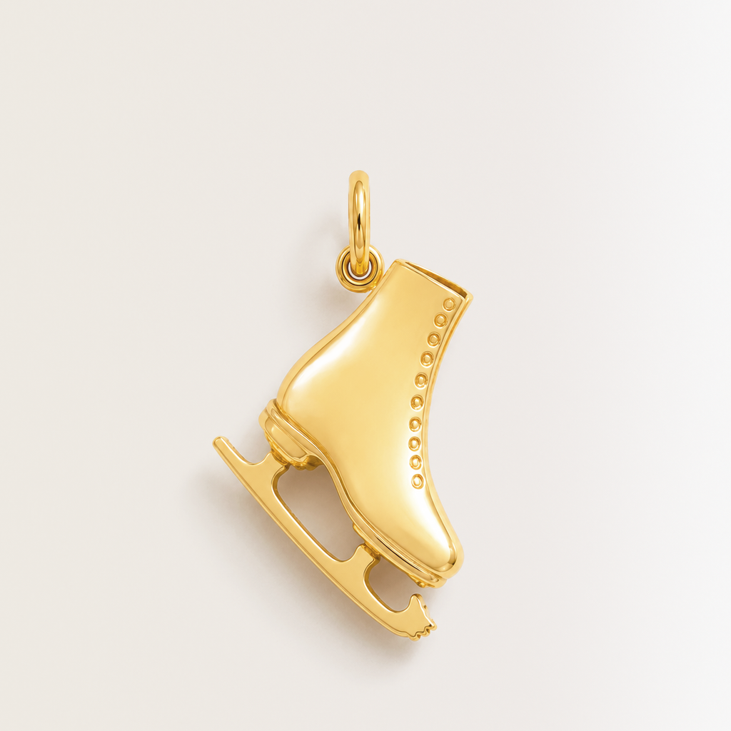 Charm de patines en oro amarillo